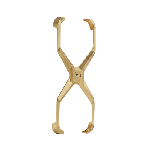 Gold metal tongs with 'Au' marking on a white background